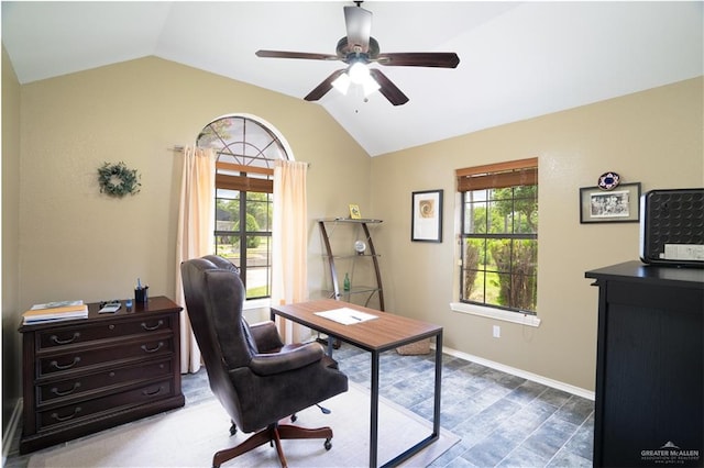 office space with ceiling fan, dark hardwood / wood-style floors, and vaulted ceiling