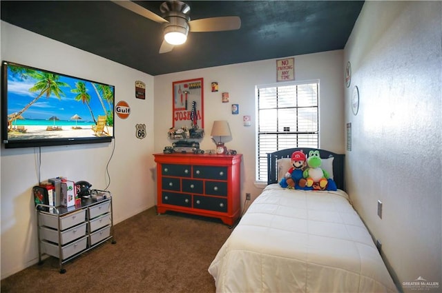 carpeted bedroom featuring a ceiling fan