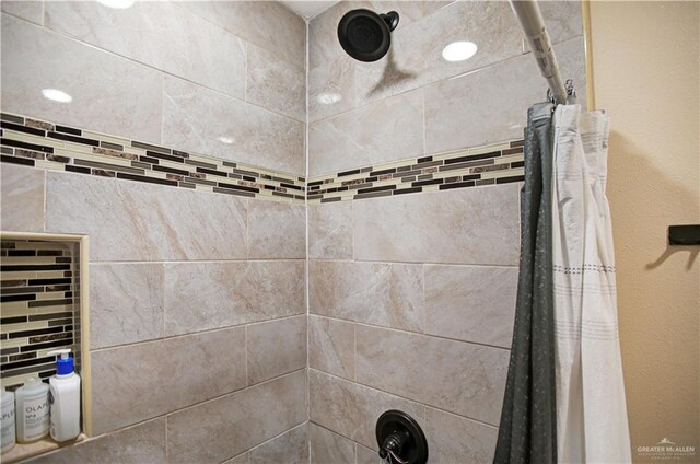 details with a tile shower