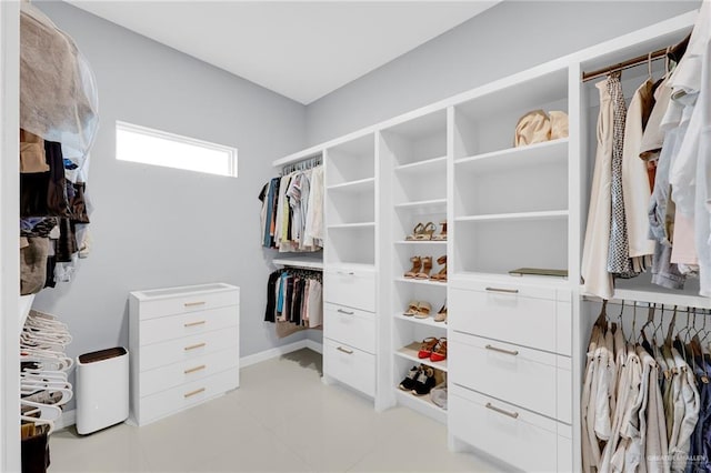6073 Surrey Ln, Brownsville, TX 78526 - walk in closet featuring light tile patterned flooring