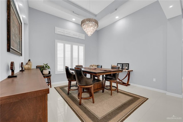 6073 Surrey Ln, Brownsville, TX 78526 - dining area featuring recessed lighting, a chandelier, a towering ceiling, baseboards, and a raised ceiling