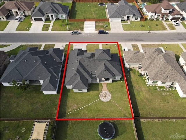 6073 Surrey Ln, Brownsville, TX 78526 - aerial perspective of suburban area with property parcel outlined