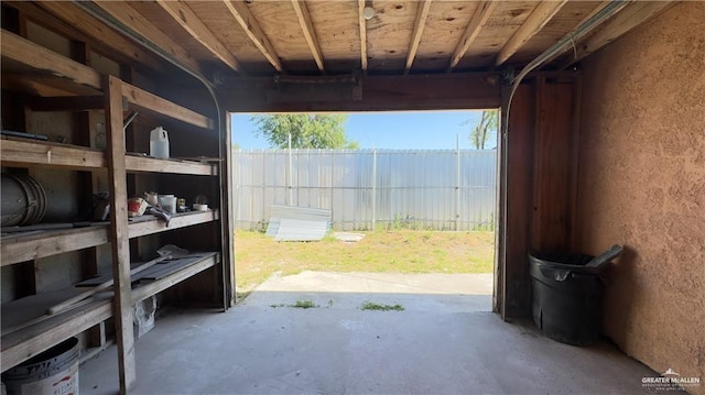 garage featuring a textured wall