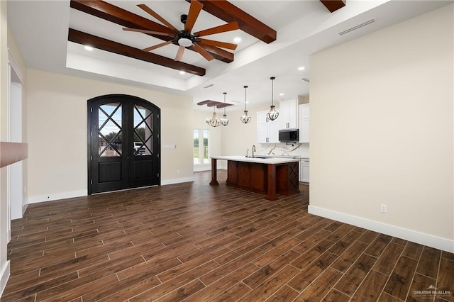15439 E Davis Rd, Edinburg, TX 78542 - entrance foyer with dark wood-type flooring, ceiling fan, beamed ceiling, baseboards, and recessed lighting