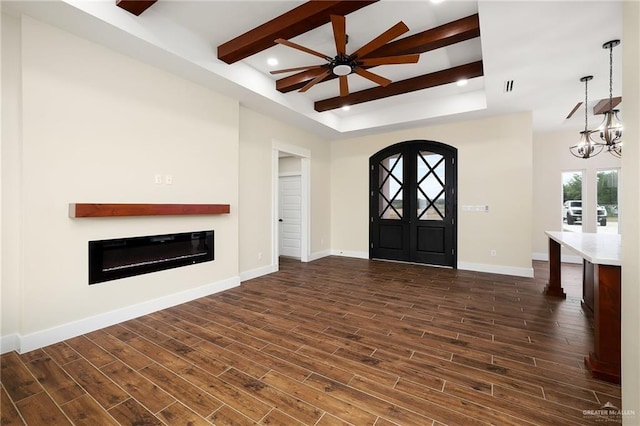 15439 E Davis Rd, Edinburg, TX 78542 - foyer entrance with dark wood-style flooring, ceiling fan, baseboards, beamed ceiling, and a glass covered fireplace