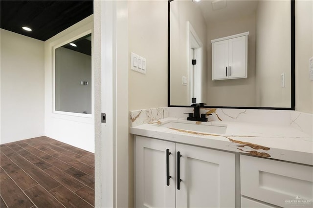 15439 E Davis Rd, Edinburg, TX 78542 - bathroom featuring vanity and wood finished floors