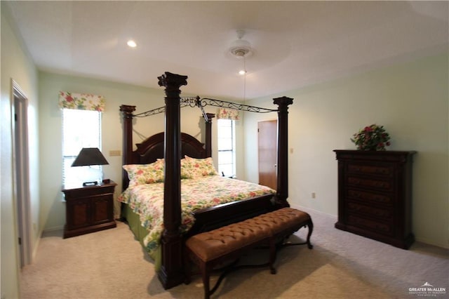 carpeted bedroom with ceiling fan