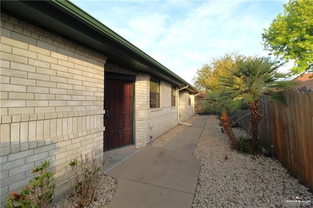 view of property exterior featuring a patio