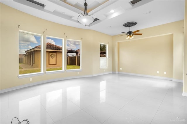 spare room featuring ceiling fan and light tile patterned flooring