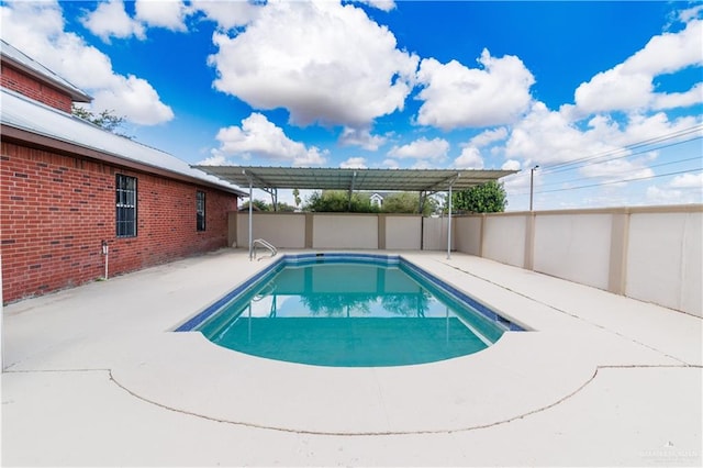 view of swimming pool featuring a patio