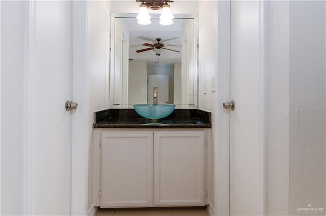 bathroom with vanity, tile patterned floors, and ceiling fan