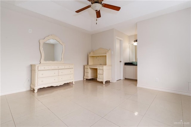 unfurnished bedroom with ceiling fan and light tile patterned flooring