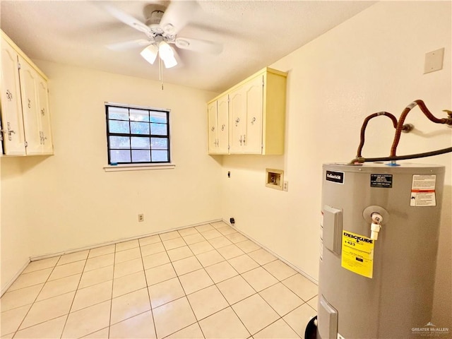 clothes washing area featuring cabinets, ceiling fan, light tile patterned floors, water heater, and hookup for an electric dryer