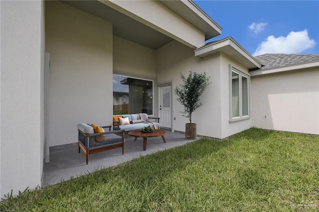 1104 Azalea Ave, Mission, TX 78573 - back of house featuring outdoor lounge area, a lawn, a patio, and stucco siding