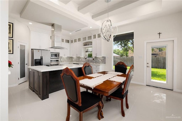 dining area featuring light tile patterned flooring, an inviting chandelier, recessed lighting, and plenty of natural light