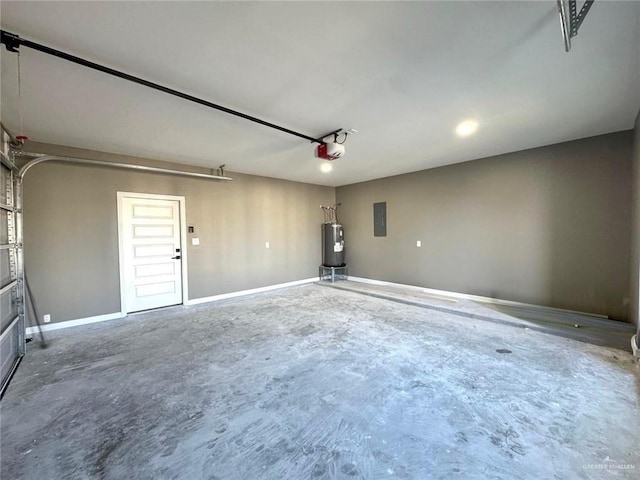 garage with a garage door opener, electric panel, and electric water heater