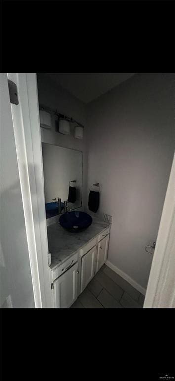 2201 S Jackson Rd Unit J11, Pharr, TX 78577 - bathroom with baseboards and vanity
