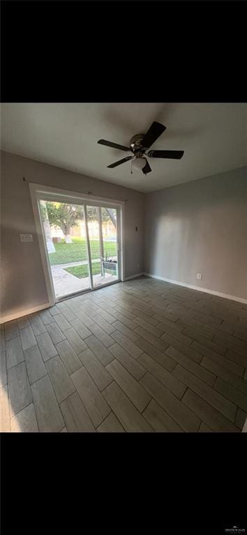 2201 S Jackson Rd Unit J11, Pharr, TX 78577 - spare room with baseboards, a ceiling fan, and wood finished floors