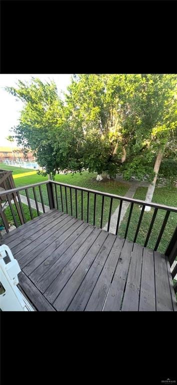 2201 S Jackson Rd Unit J11, Pharr, TX 78577 - view of wooden terrace