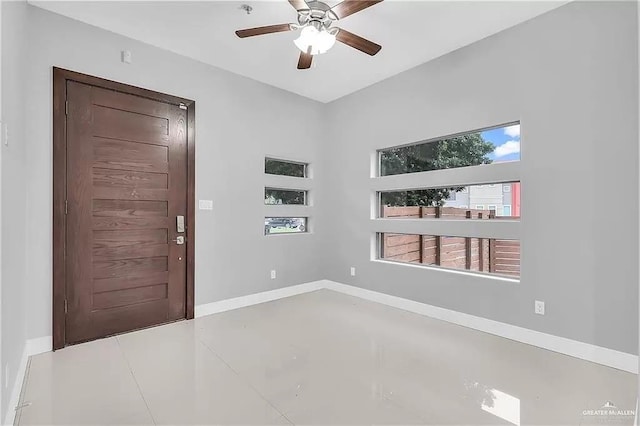 foyer entrance with tile patterned floors