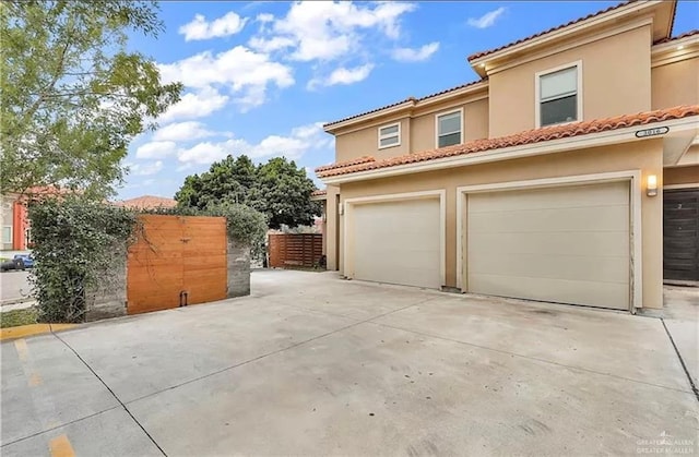 exterior space with a garage