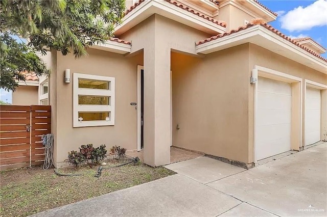 doorway to property featuring a garage