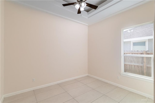 unfurnished room with ceiling fan and light tile patterned floors