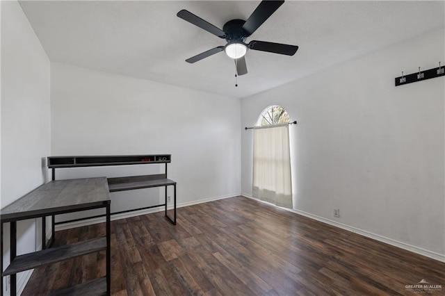 interior space featuring ceiling fan and dark hardwood / wood-style flooring