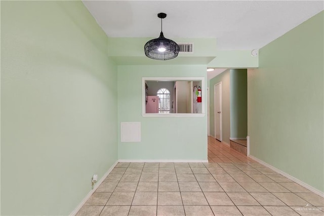 view of tiled spare room