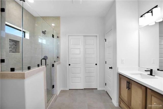 1502 Stirrup Cir, San Benito, TX 78586 - full bathroom with vanity, a stall shower, and a closet