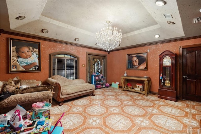 interior space with a notable chandelier, ornamental molding, and a tray ceiling