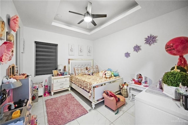 1613 E Mayhem Dr, Edinburg, TX 78542 - bedroom featuring a tray ceiling and ceiling fan