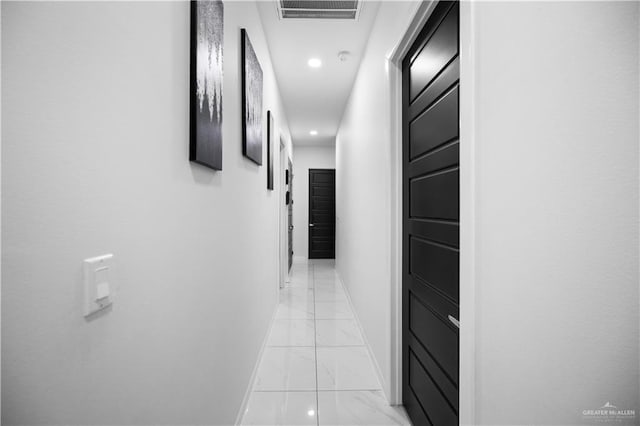 1613 E Mayhem Dr, Edinburg, TX 78542 - hall featuring light marble finish flooring, baseboards, and recessed lighting