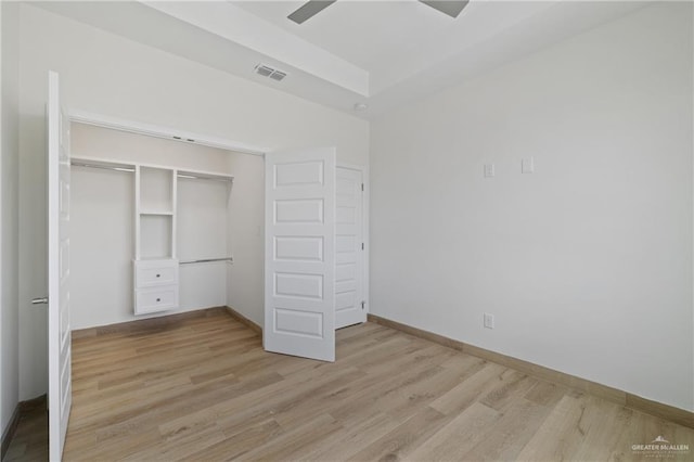 1214 N Lincoln Ave, San Juan, TX 78589 - unfurnished bedroom featuring light wood-type flooring, a closet, baseboards, and ceiling fan