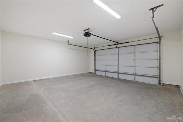 1214 N Lincoln Ave, San Juan, TX 78589 - garage featuring a garage door opener and baseboards