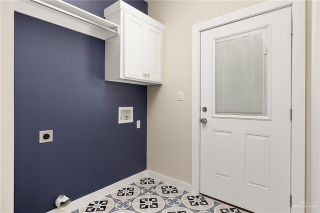 3409 Emma Dr, Weslaco, TX 78596 - laundry room with cabinet space, tile patterned floors, electric dryer hookup, baseboards, and hookup for a washing machine