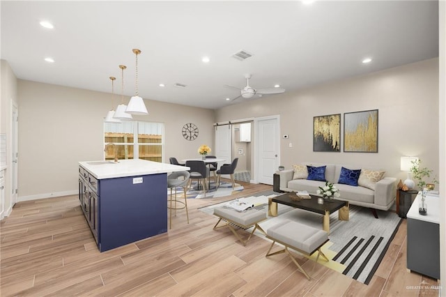 3409 Emma Dr, Weslaco, TX 78596 - living room featuring light wood-type flooring, recessed lighting, and ceiling fan