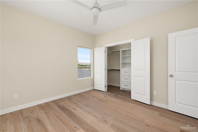 3409 Emma Dr, Weslaco, TX 78596 - unfurnished bedroom with baseboards, a closet, light wood-style flooring, and a ceiling fan
