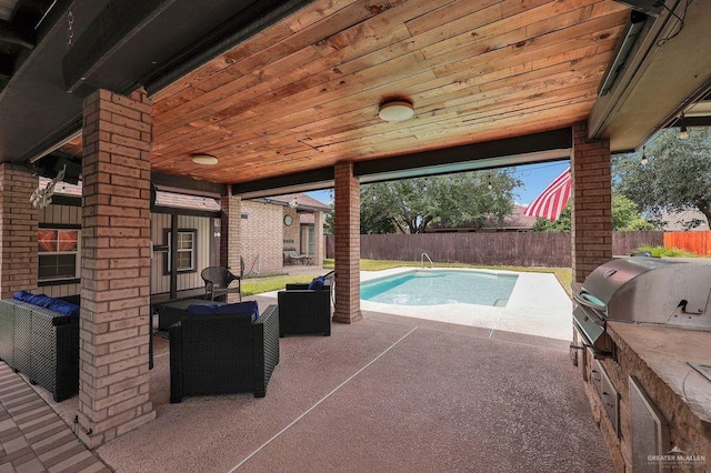 3908 Hill Crest Dr, Mission, TX 78573 - view of swimming pool featuring a patio area, a fenced backyard, area for grilling, and an outdoor living space