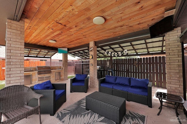 3908 Hill Crest Dr, Mission, TX 78573 - fenced backyard with outdoor lounge area and area for grilling