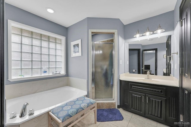 3908 Hill Crest Dr, Mission, TX 78573 - full bathroom with a garden tub, vanity, a stall shower, and tile patterned flooring