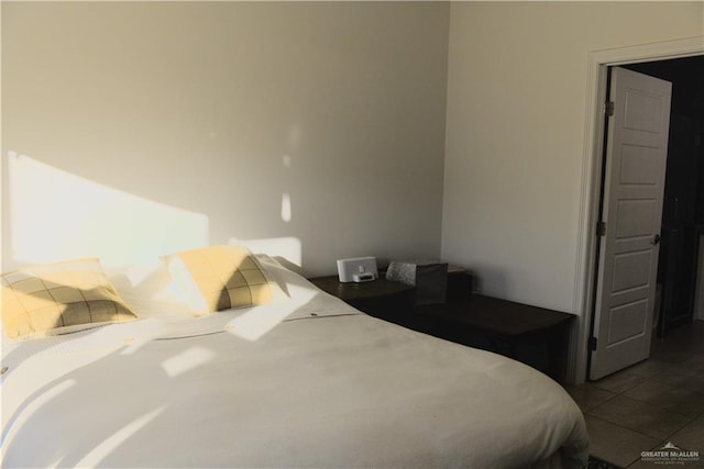 bedroom featuring tile patterned flooring