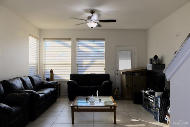 tiled living room featuring ceiling fan