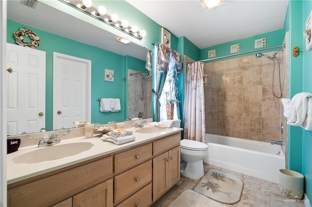 full bathroom with tile patterned floors, vanity, shower / bath combination with curtain, and toilet