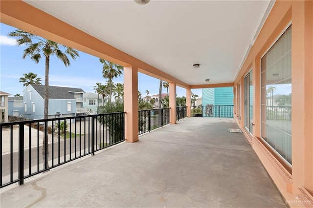 view of patio featuring a balcony