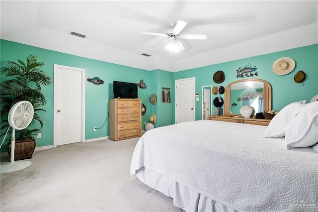 carpeted bedroom with ceiling fan