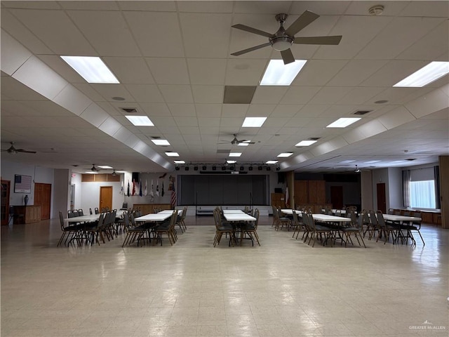 dining room featuring visible vents, a paneled ceiling, and ceiling fan