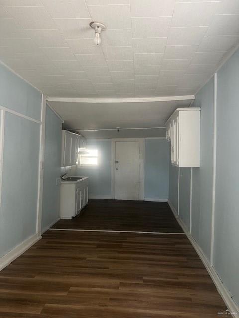 1151 S Texas Ave, Mercedes, TX 78570 - interior space featuring dark wood finished floors