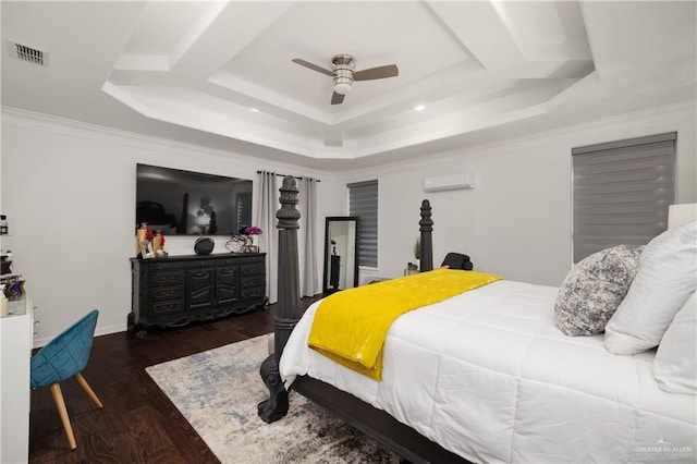 bedroom with dark hardwood / wood-style flooring, ceiling fan, a raised ceiling, and an AC wall unit