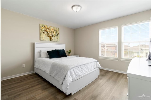 6327 Cascada Bend Rd, Mcallen, TX 78504 - bedroom with light wood-type flooring and baseboards